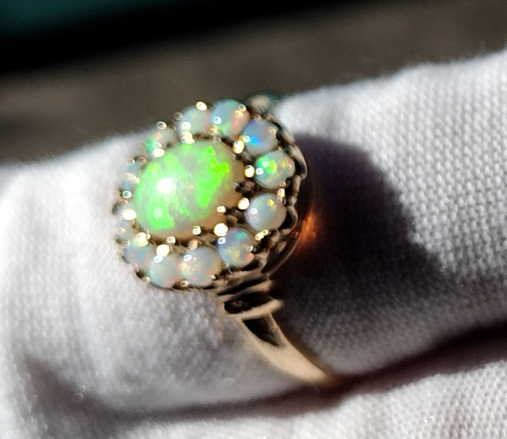 Australian Red Flash Opal Halo Ring
10K Gold C.1950 Size 8 3/4